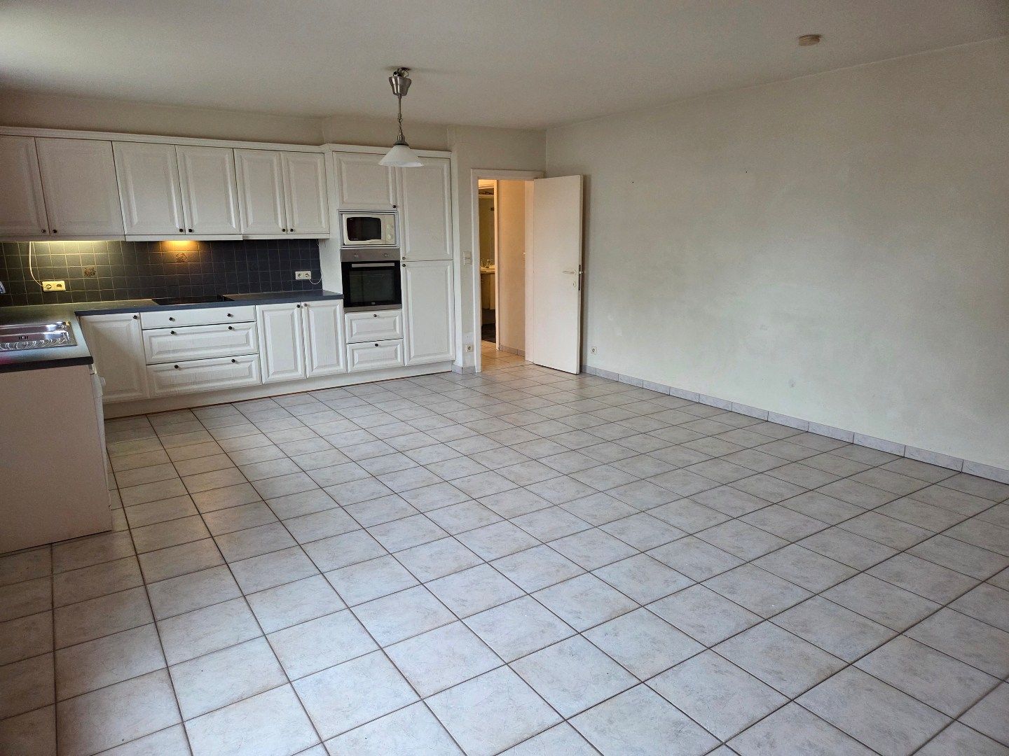 Ruim dakappartement met 3 slaapkamers in Boortmeerbeek. foto 7