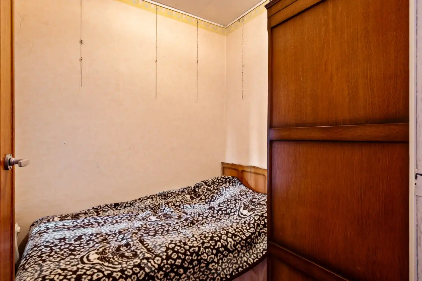 Te renoveren woning met 2 slpk., dubbele garage en tuin foto 17