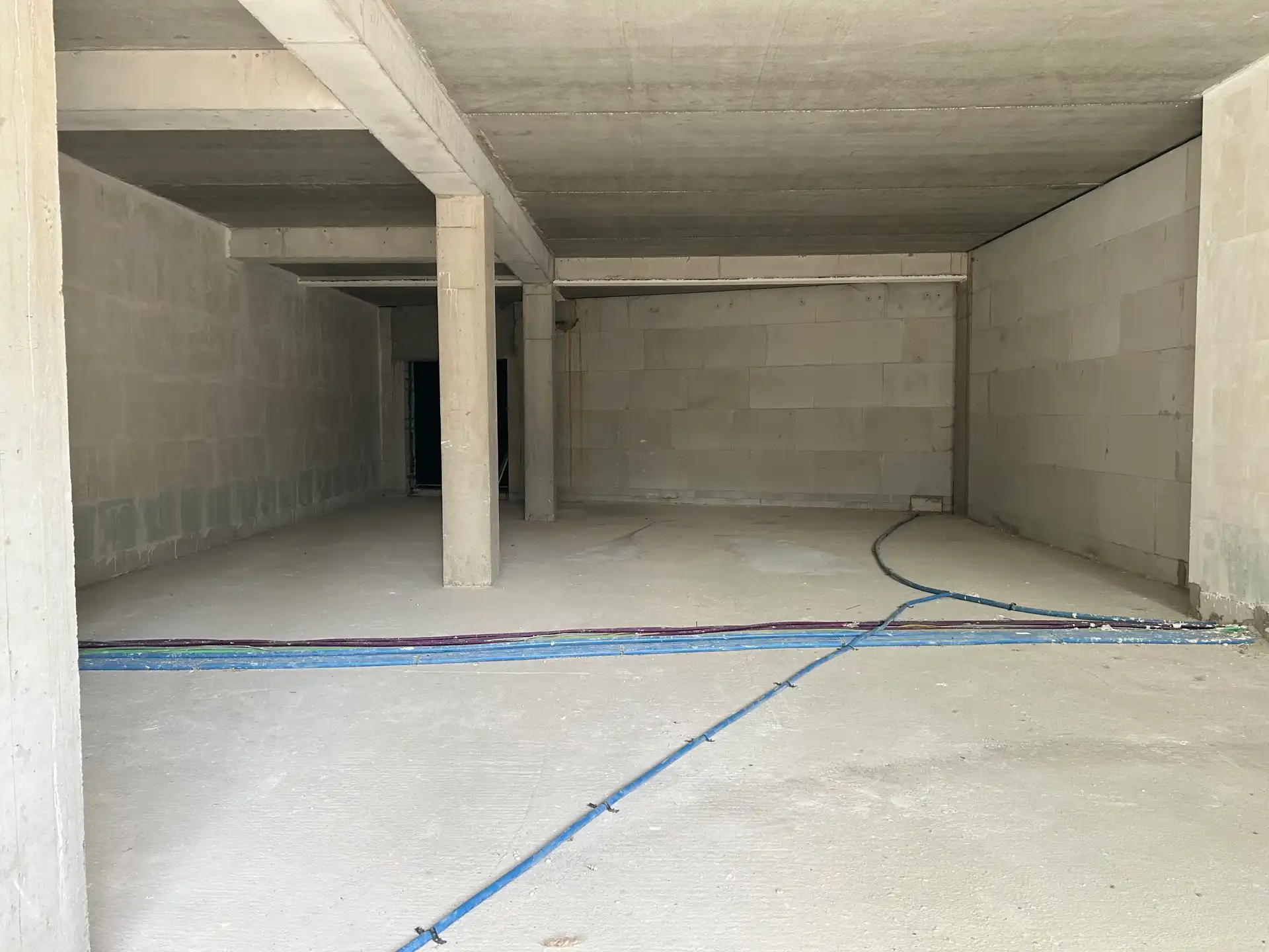 Knap casco handelspand van 184 m² in Residentie "De Voogdij" in het centrum van Mol.  foto 12