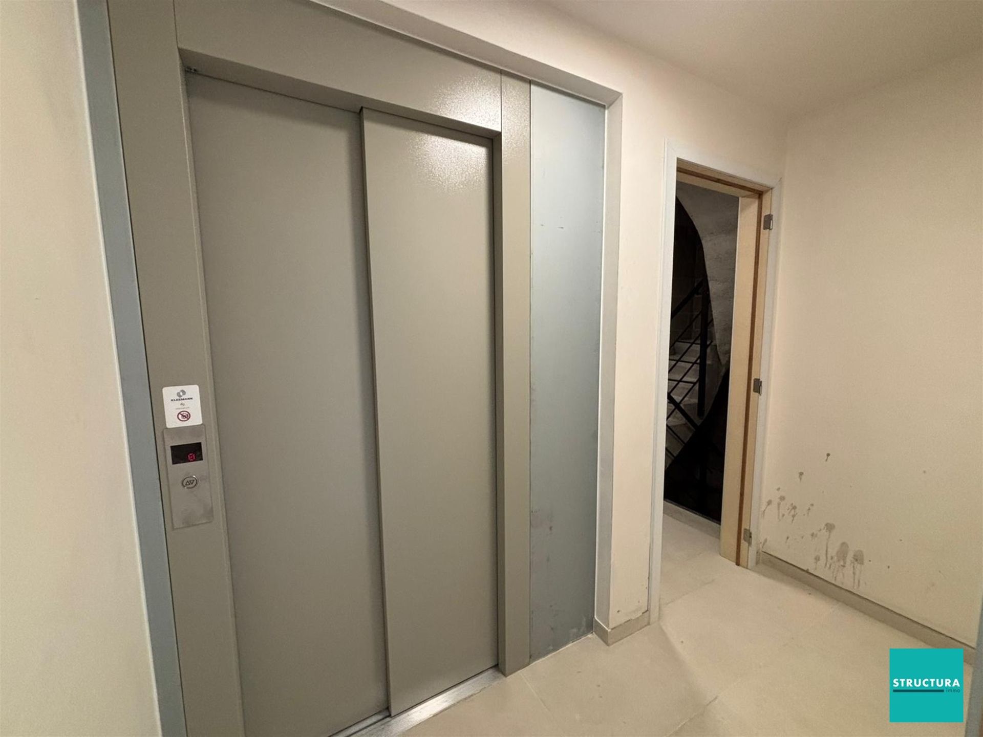 Appartement met 2 slaapkamers en 2 staanplaatsen in centrum Merchtem foto 13