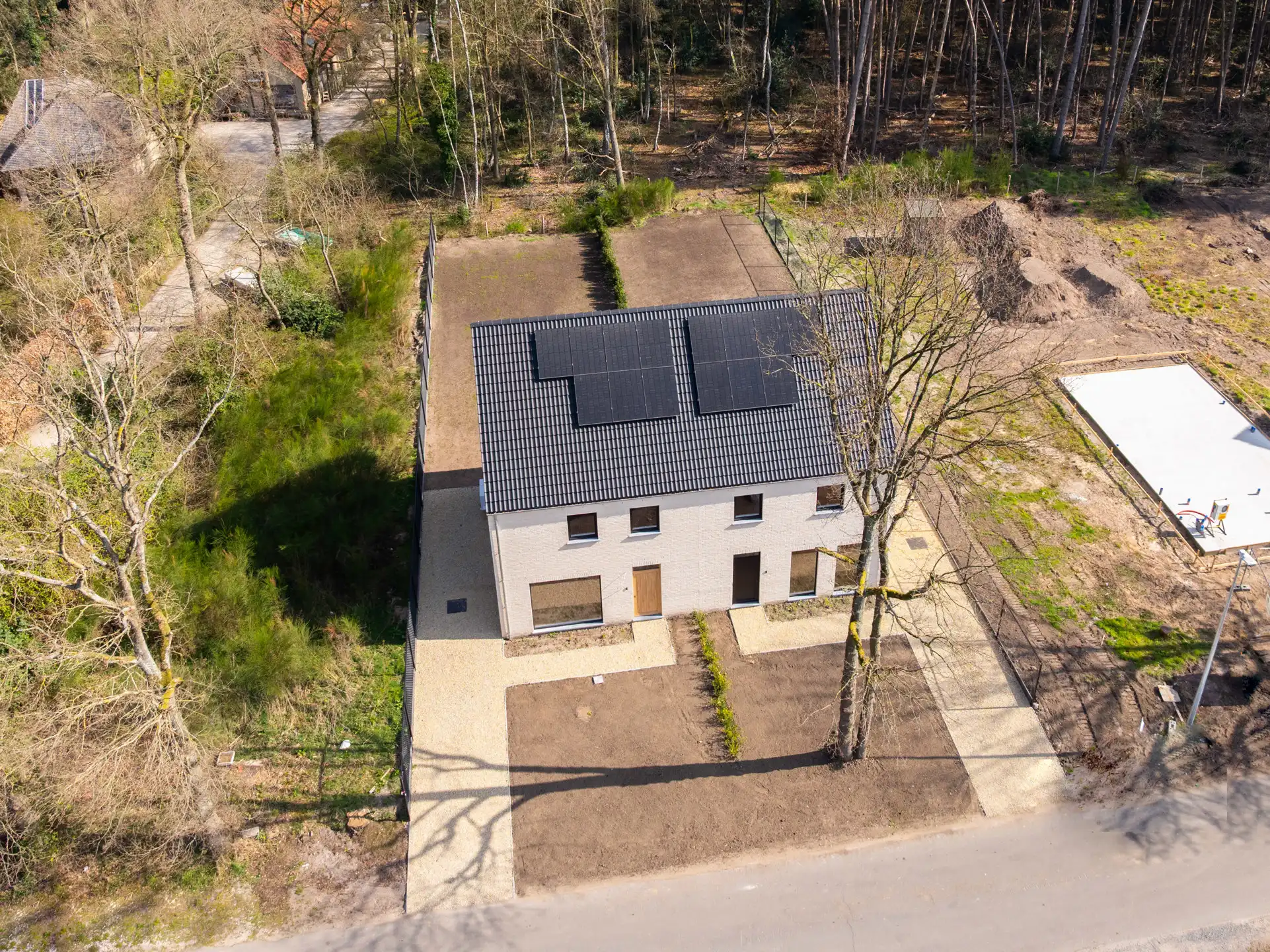 Stijlvolle nieuwbouwkoppelwoning met adembenemend boszicht foto 33