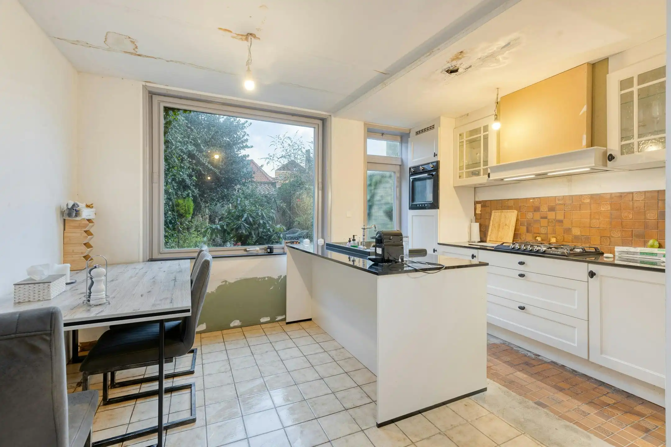 Rijwoning met 3 slaapkamers en stadsterras te koop in Brugge foto 4