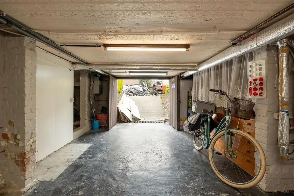 Gezellige woning met ruime garage en stadskoer foto 11