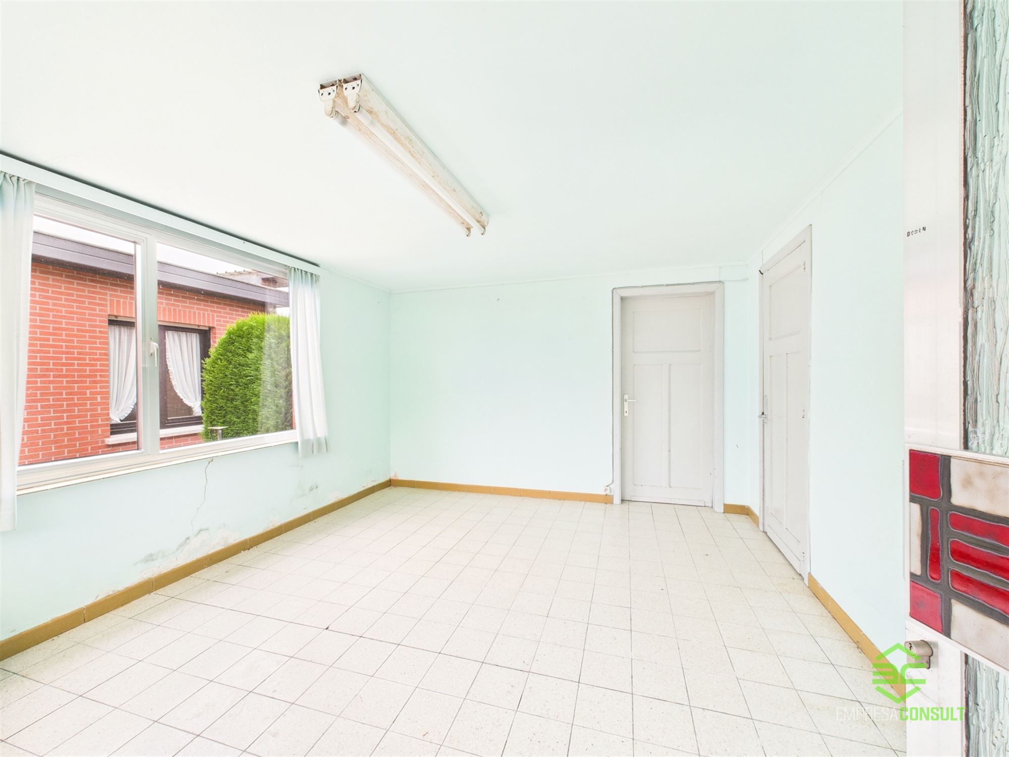 Gelijkvloerse woning in het centrum met 2 slpk en ruime tuinberging! foto 15