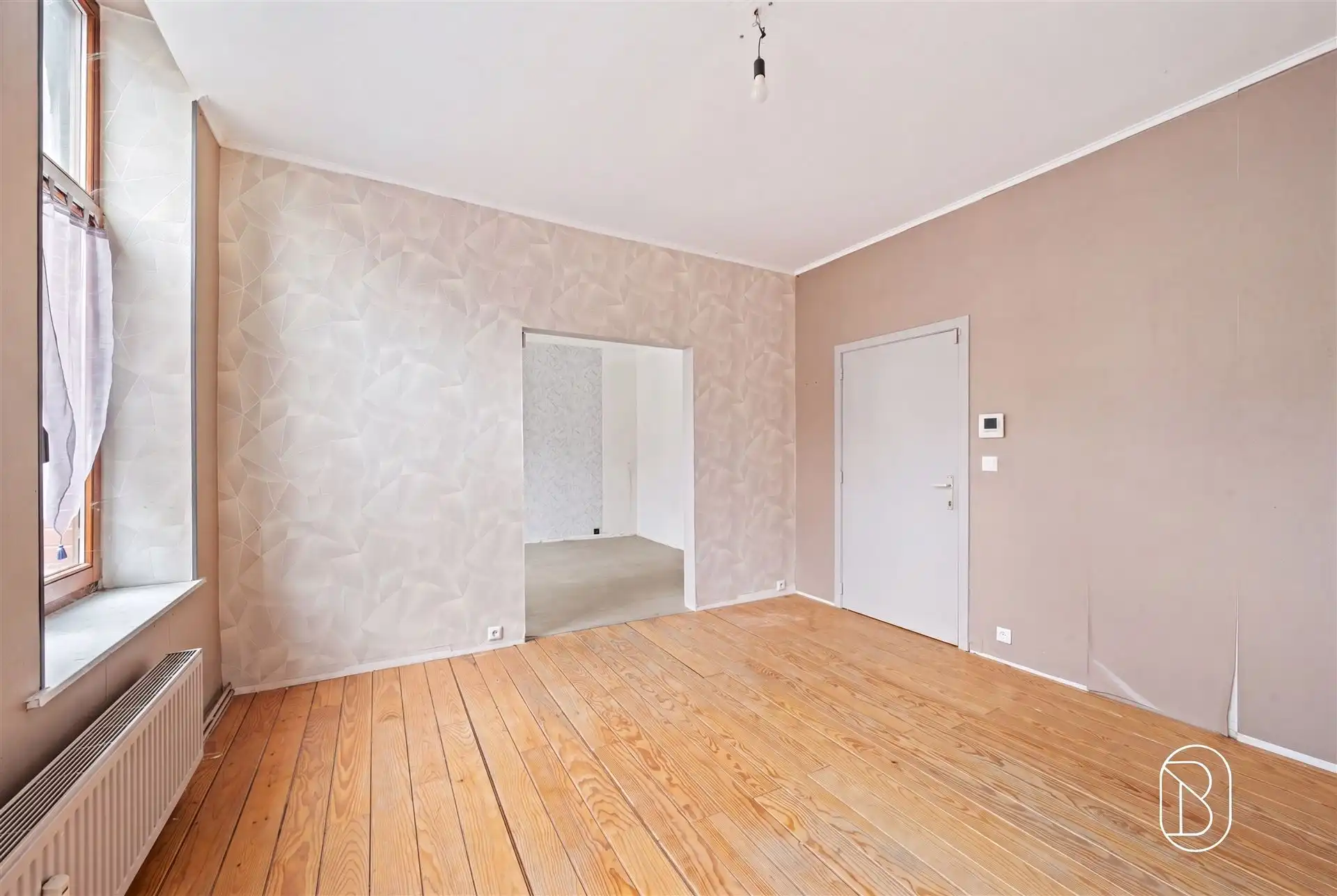 Opbrengsteigendom: handelsruimte en 2 appartementen foto 12