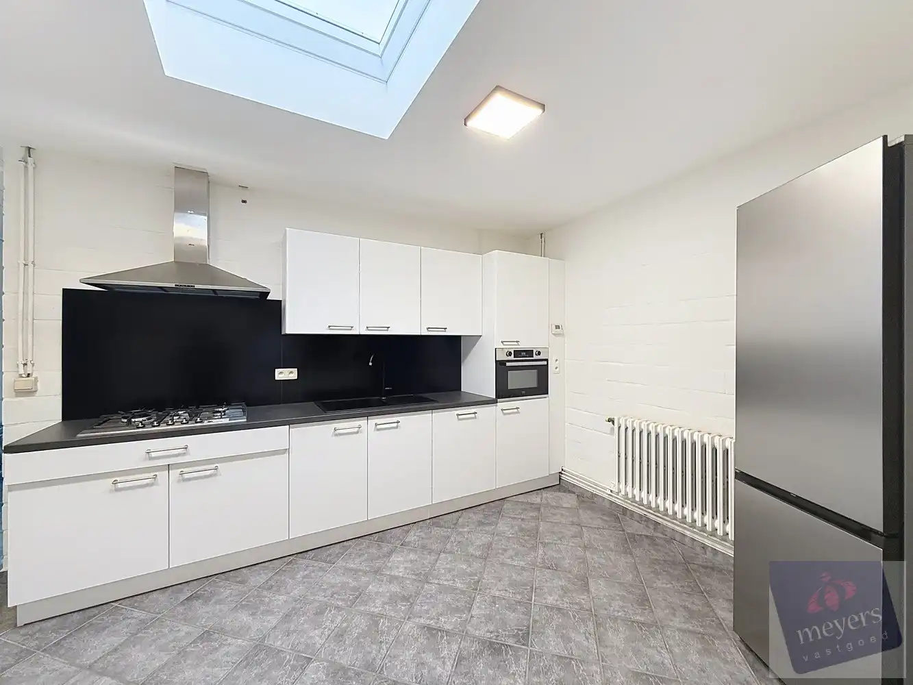 Stijlvolle halfopen bebouwing met tuin op centrale ligging in Hasselt foto 9