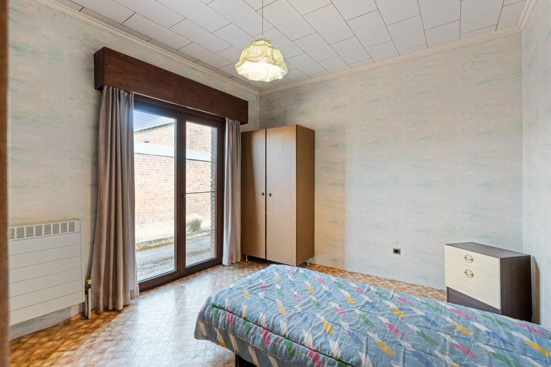 Gelijkvloerse woning met grote loods achteraan op 25are foto 27