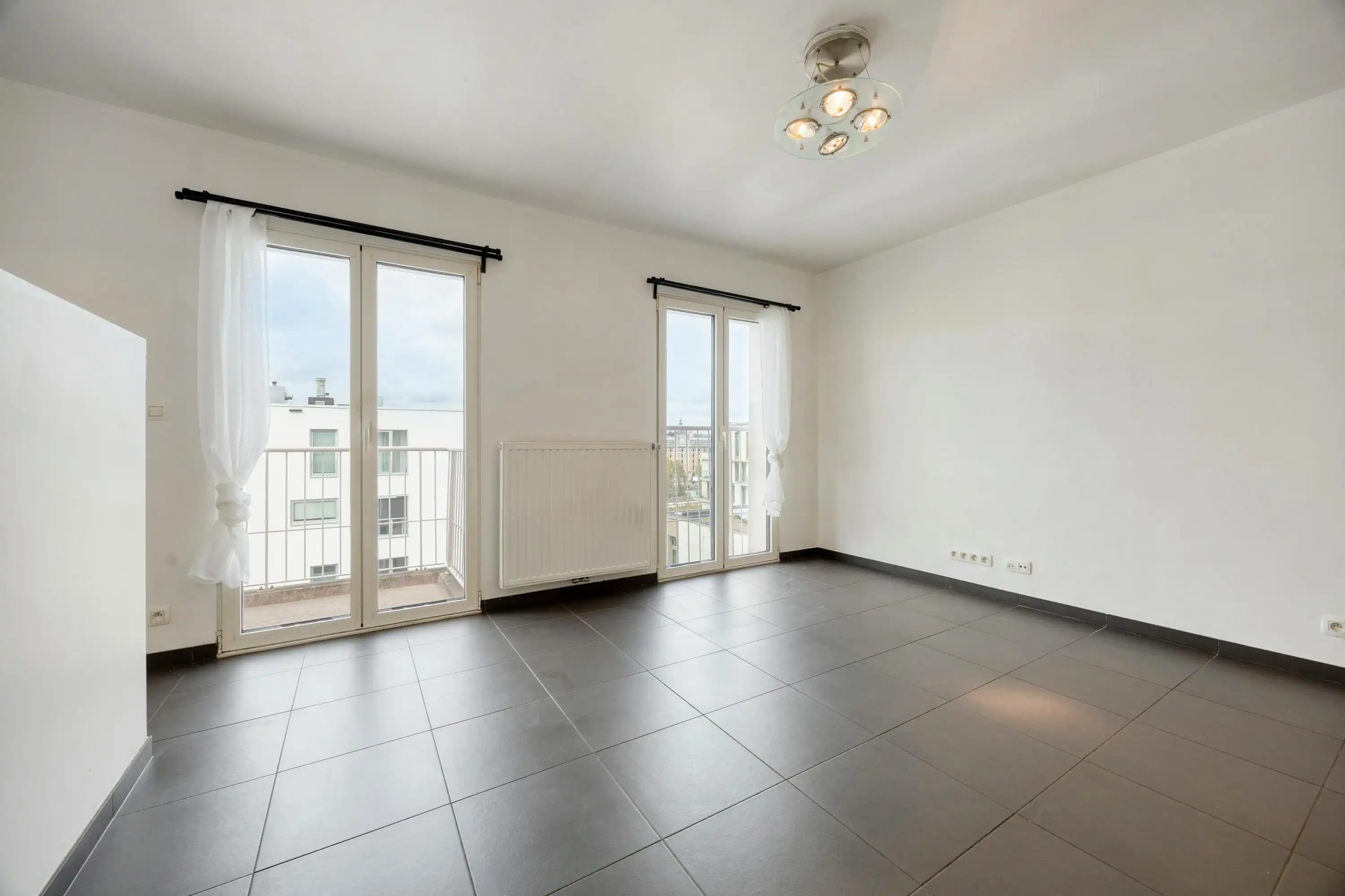 Penthouse Studio met zicht op Tour & Taxis Te koop  foto 3