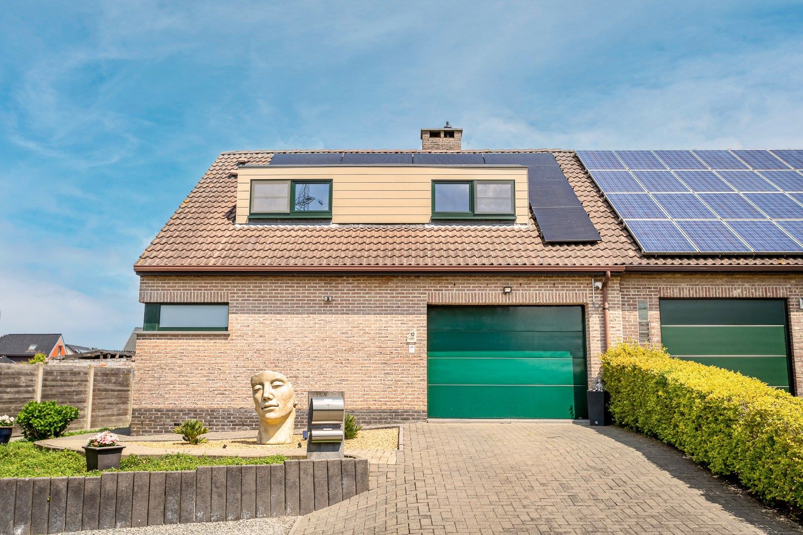 Rustig gelegen, energiezuinige woning op +/- 7a te Buizingen. foto 2
