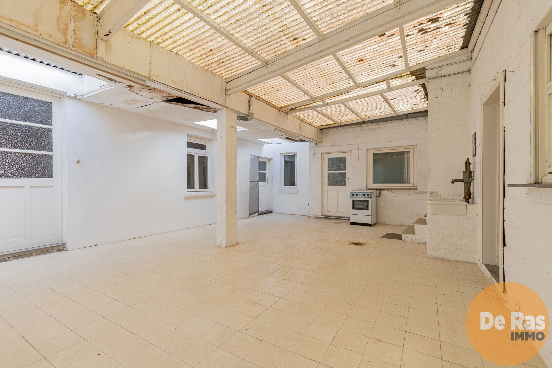 DENDERHOUTEM- Ruime 3-gevelwoning met 4 slpk, tuin en garage foto 15