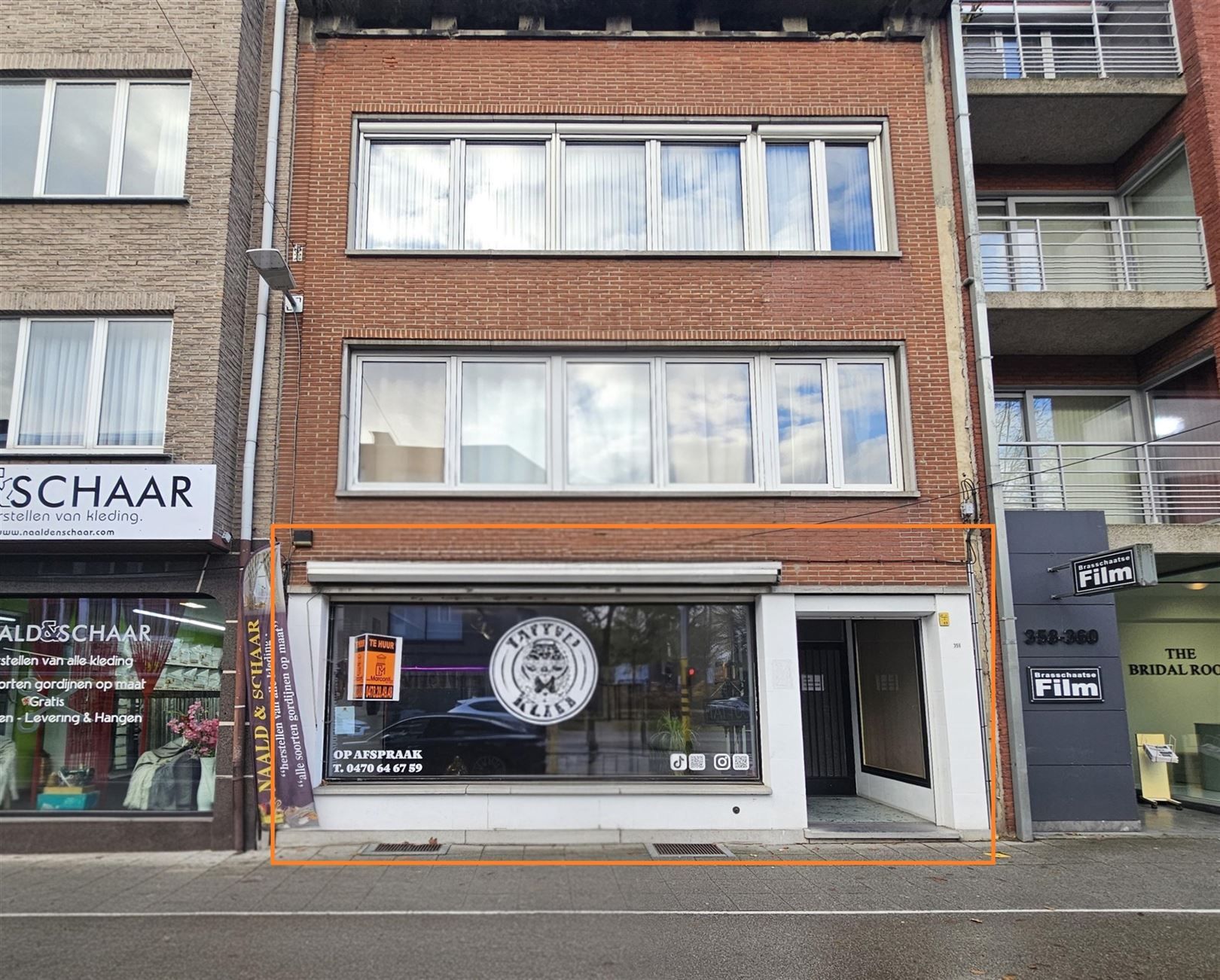 Centraal gelegen winkelpand met woonst en tuin foto {{pictureIndex}}