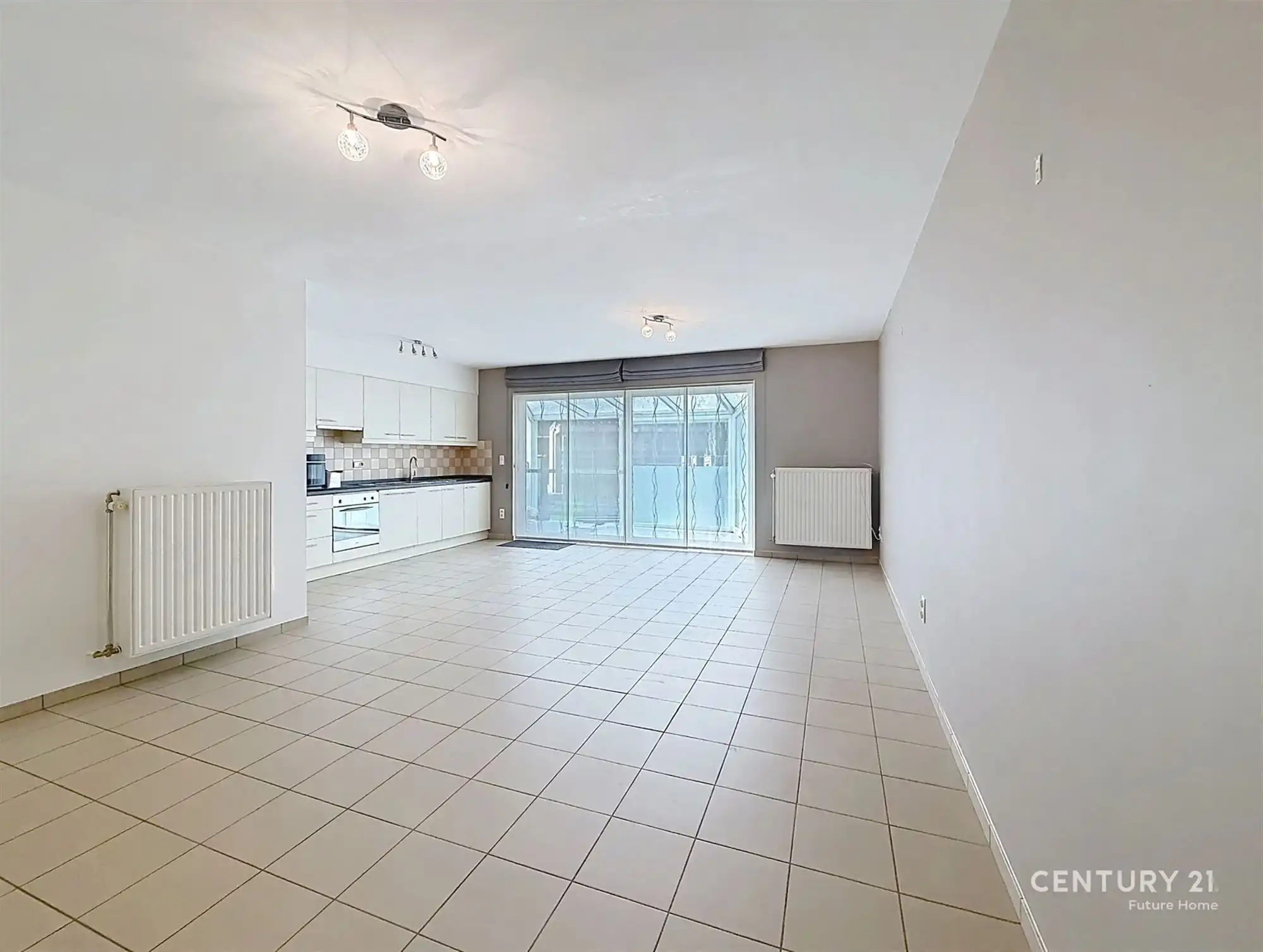 Gelijkvloers appartement met overdekt terras en tuin! foto 2