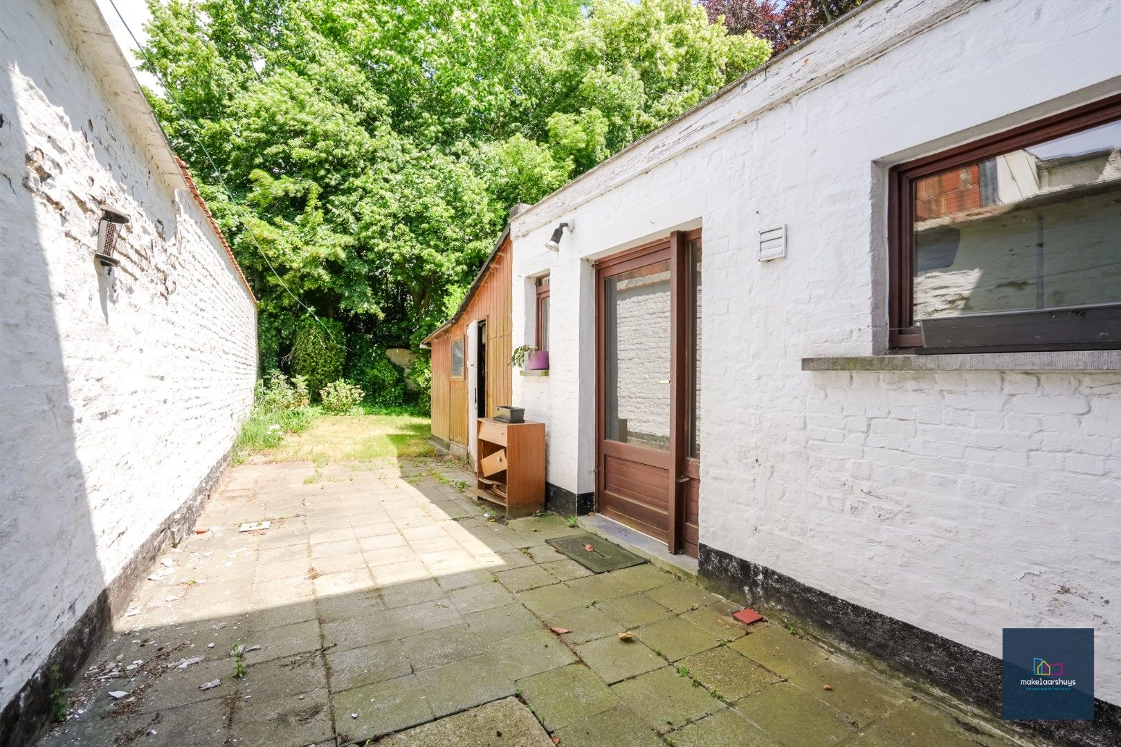 Centraal gelegen te renoveren woning in rij met tuin te Mariakerke foto 15
