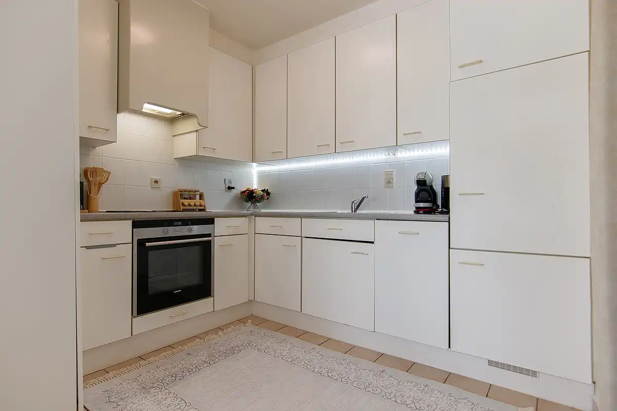 Verzorgd appartement met 2 slaapkamers,  groot terras en lift foto 15