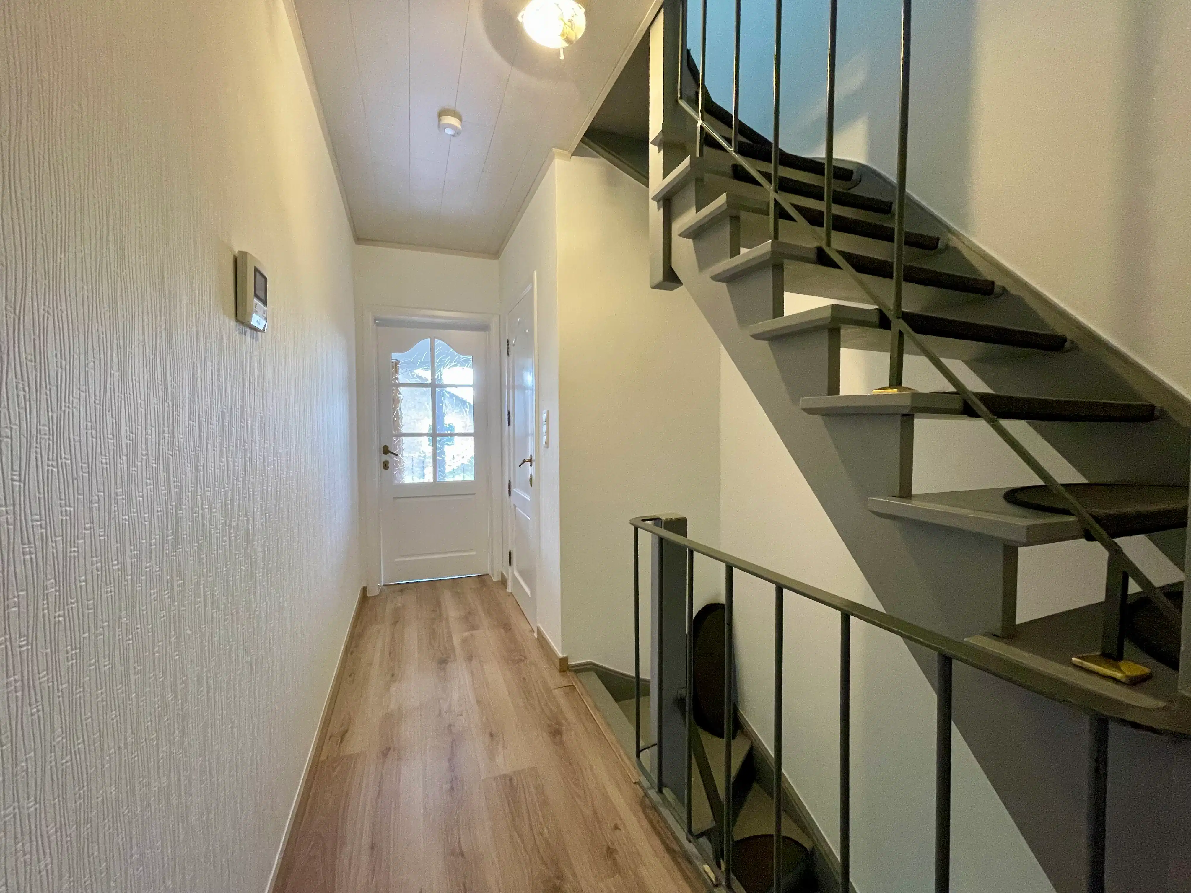 Ruim duplexappartement met 3 slaapkamers foto 2