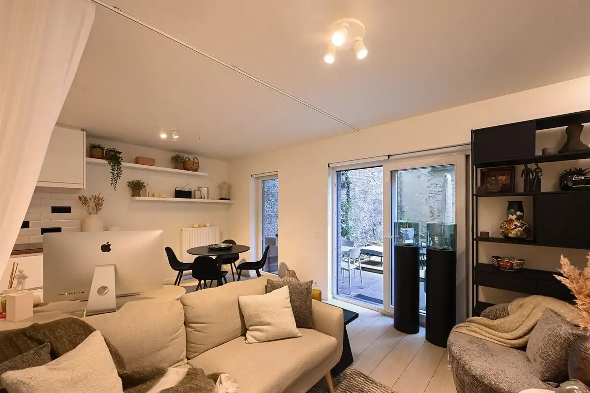 Instapklaar gelijkvloersappartement met heerlijke stadstuin foto 17