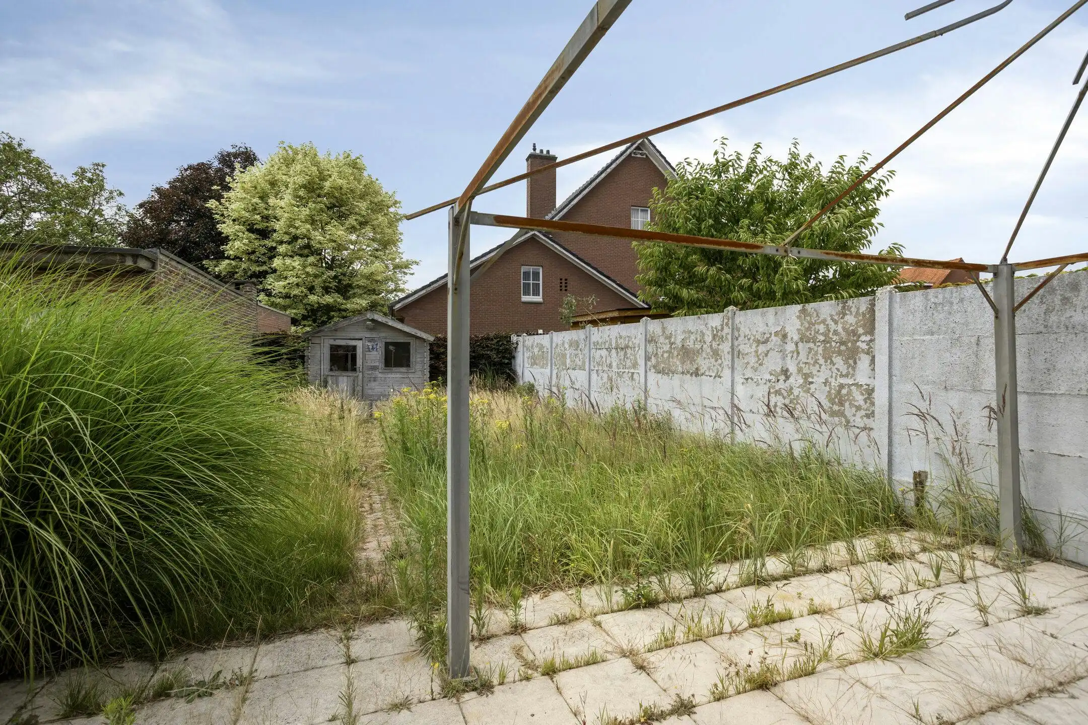 Te renoveren huis met vier slaapkamers en tuin in Kruibeke foto 16