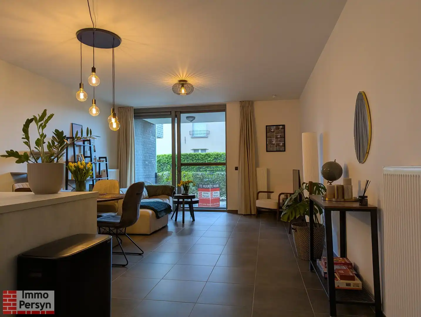 Gelijksvloer appartement met tuintje foto 3