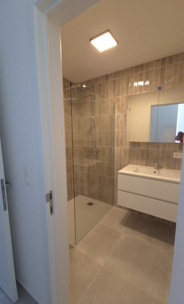 Stijlvol gelijkvloers nieuwbouwappartement met 2 autostaanplaatsen en kelder foto 10