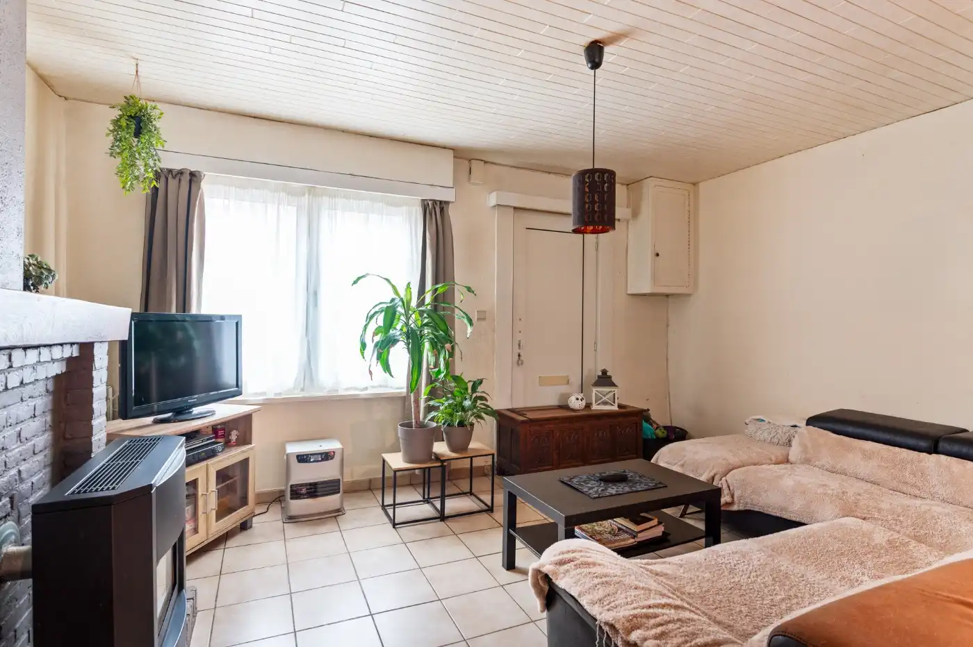 Te renoveren woning met 2 slpk. en tuin foto 2