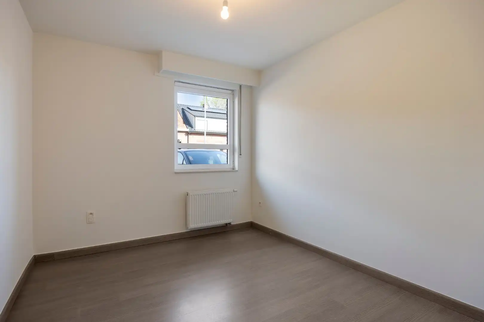 Ruim gelijkvloers 2 slaapkamer appartement met garage op centrale ligging te Dessel foto 12