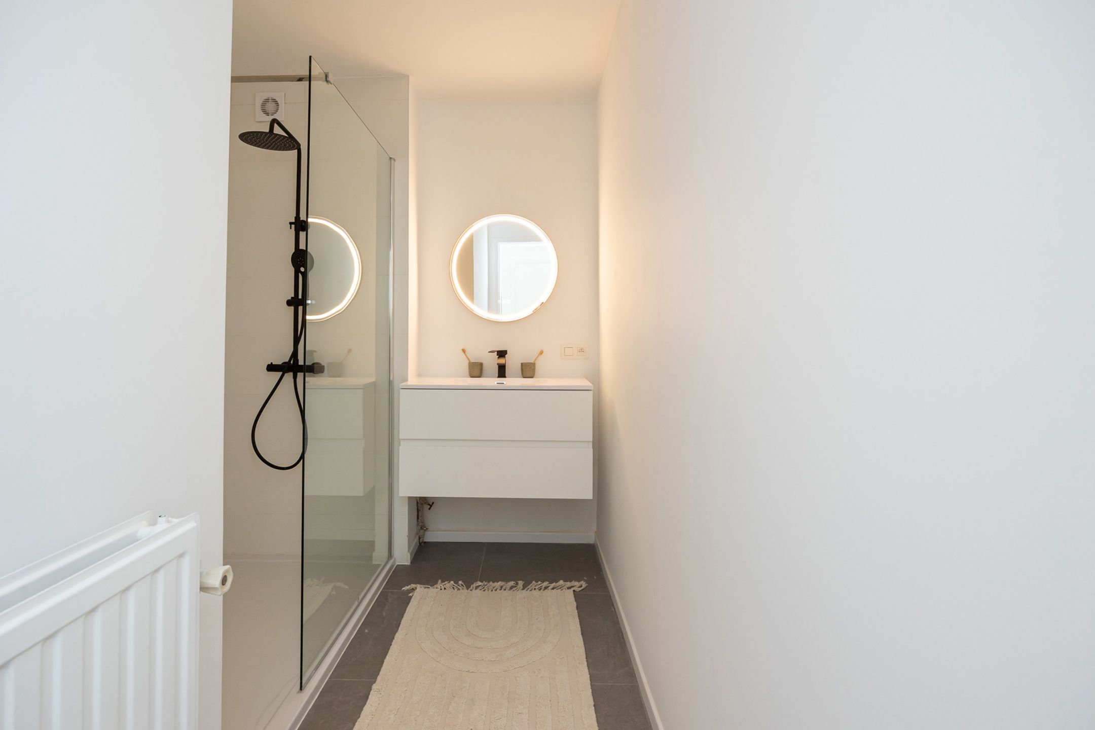 Gerenoveerd gelijkvloers appartement met tuin foto 14