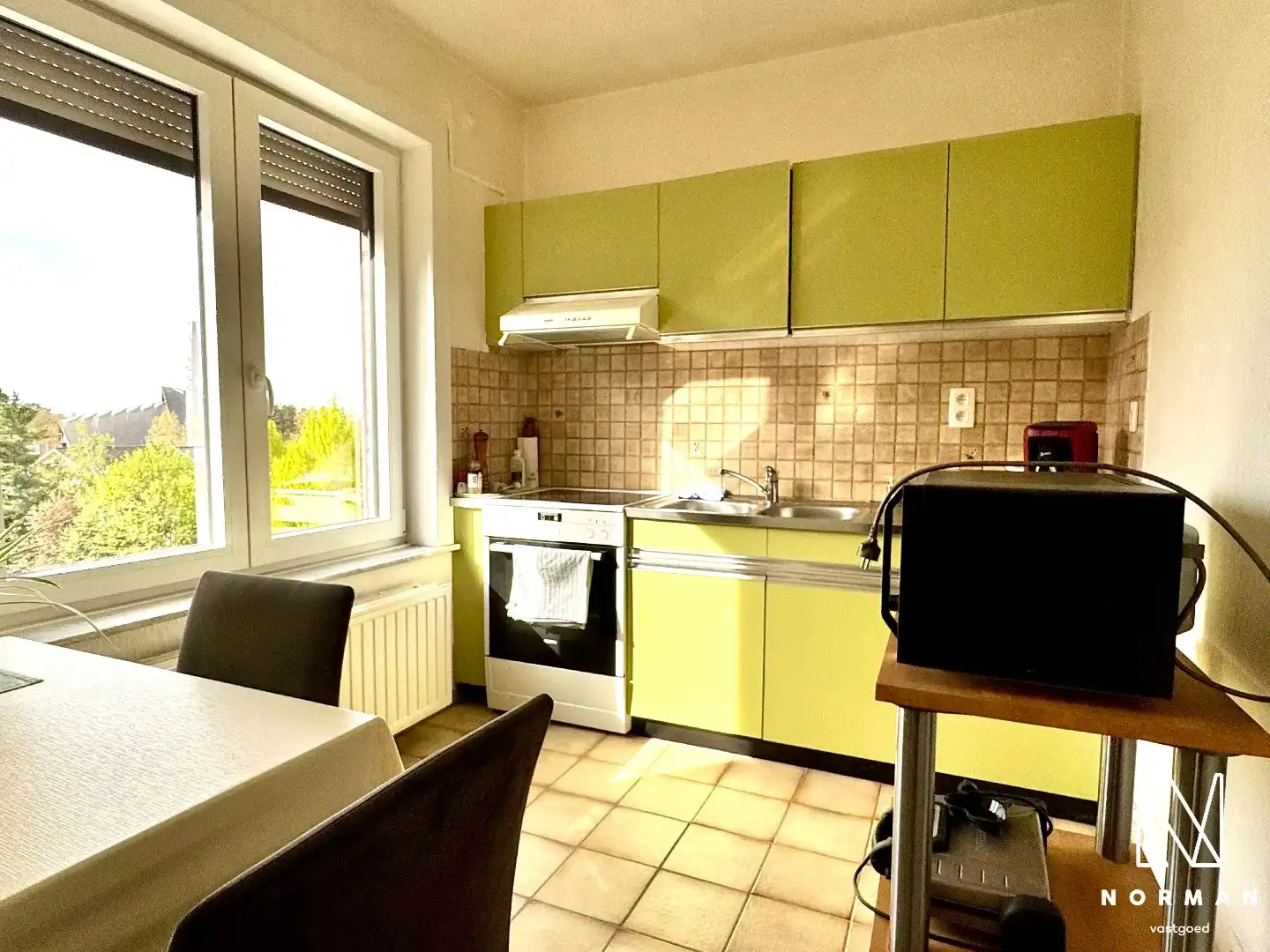 Instapklaar 2slk appt, met terras, autostaanplaats, blanco gekeurde elektriciteit en epc B foto 12