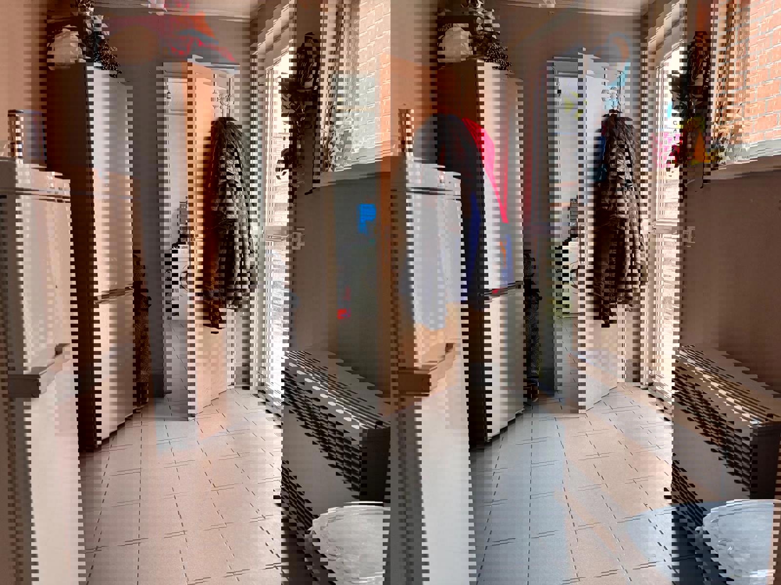 Rijwoning met uitweg achteraan met carport in de directe nabijheid van scholen, centrum  en openbaar vervoer. foto 7