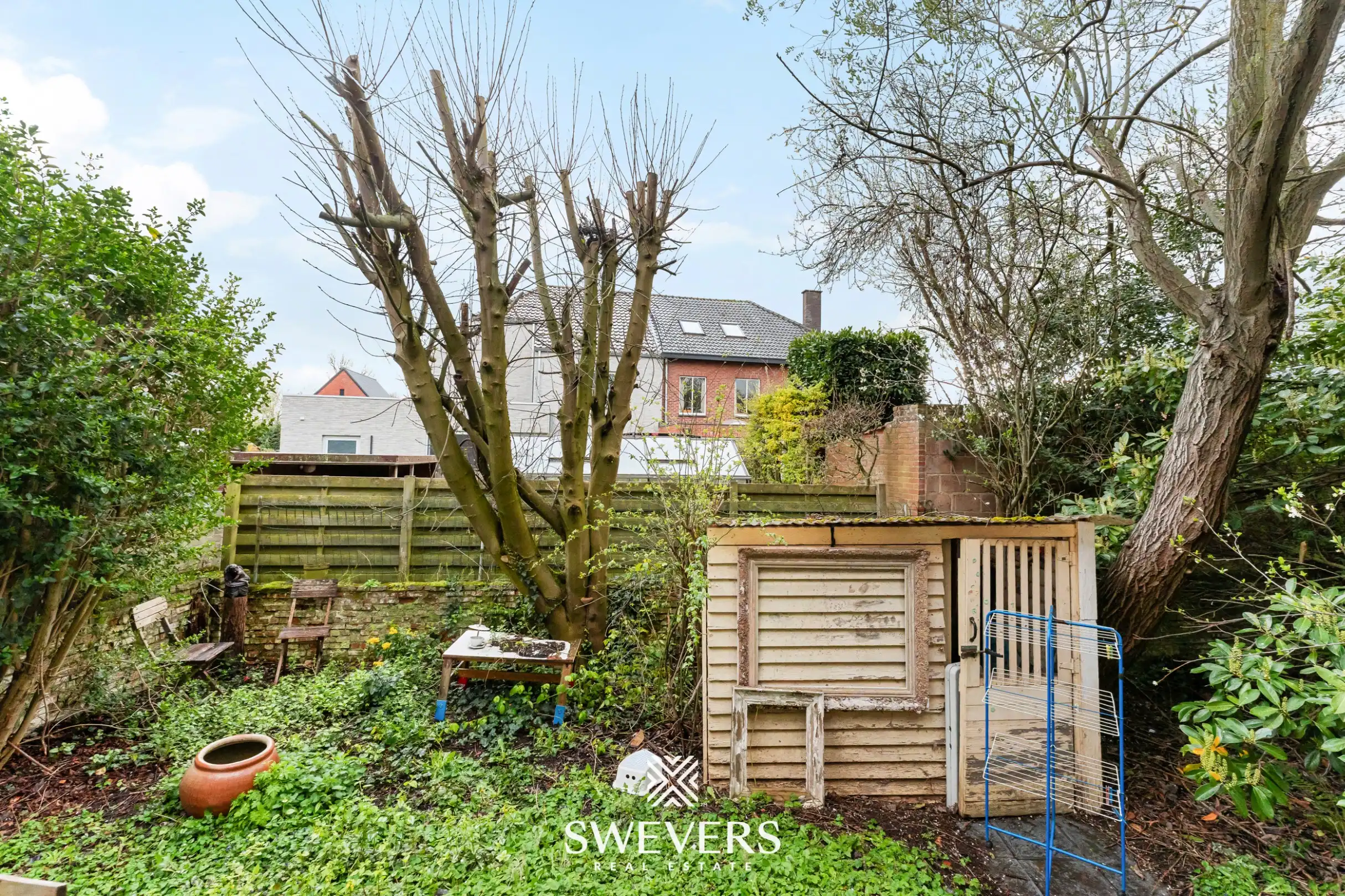 Ruime halfopen bebouwing met 4 slaapkamers en veel renovatiepotentieel op topligging in Hasselt foto 25