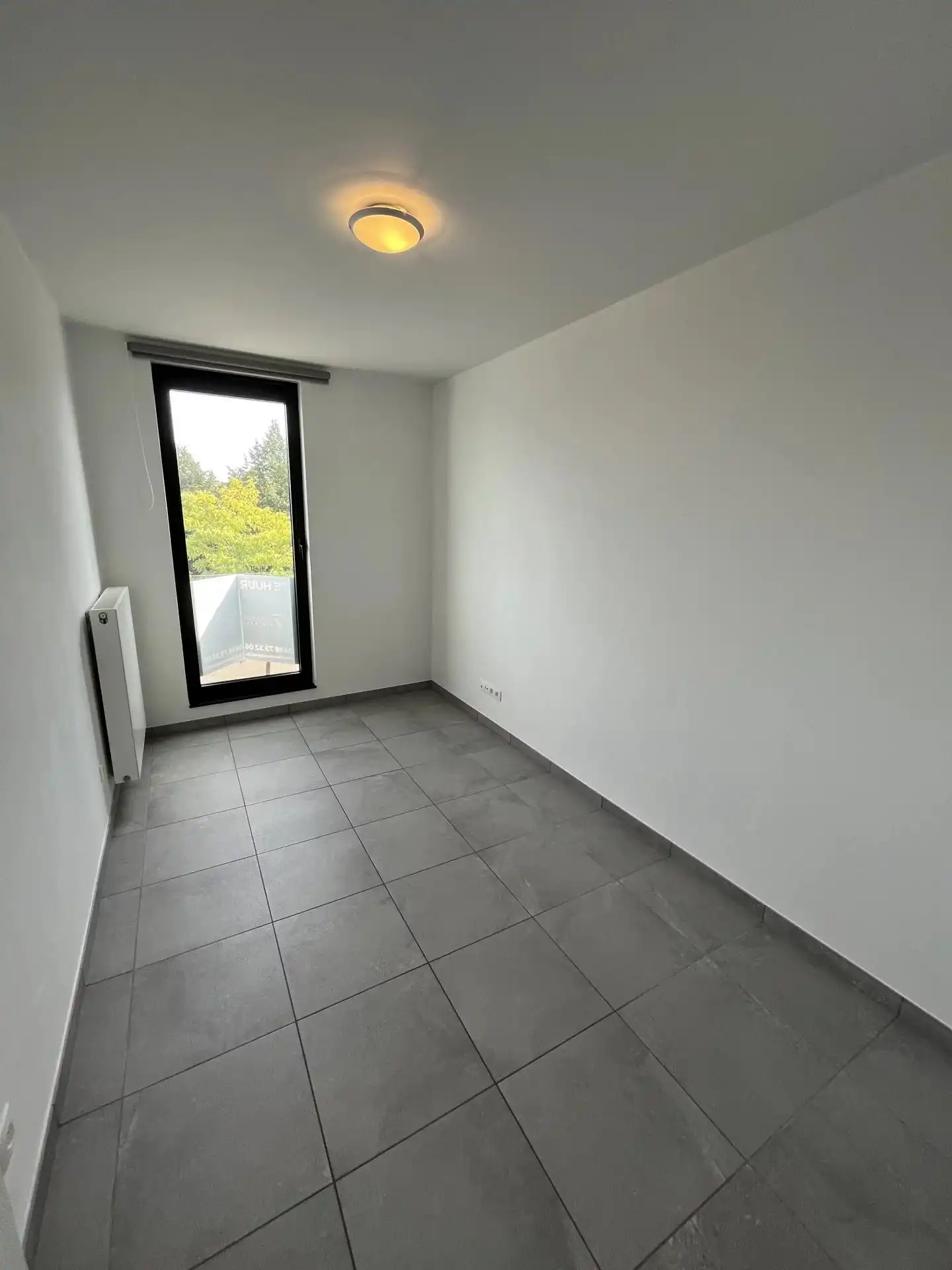 Instapklaar appartement te Zolder centrum foto 14