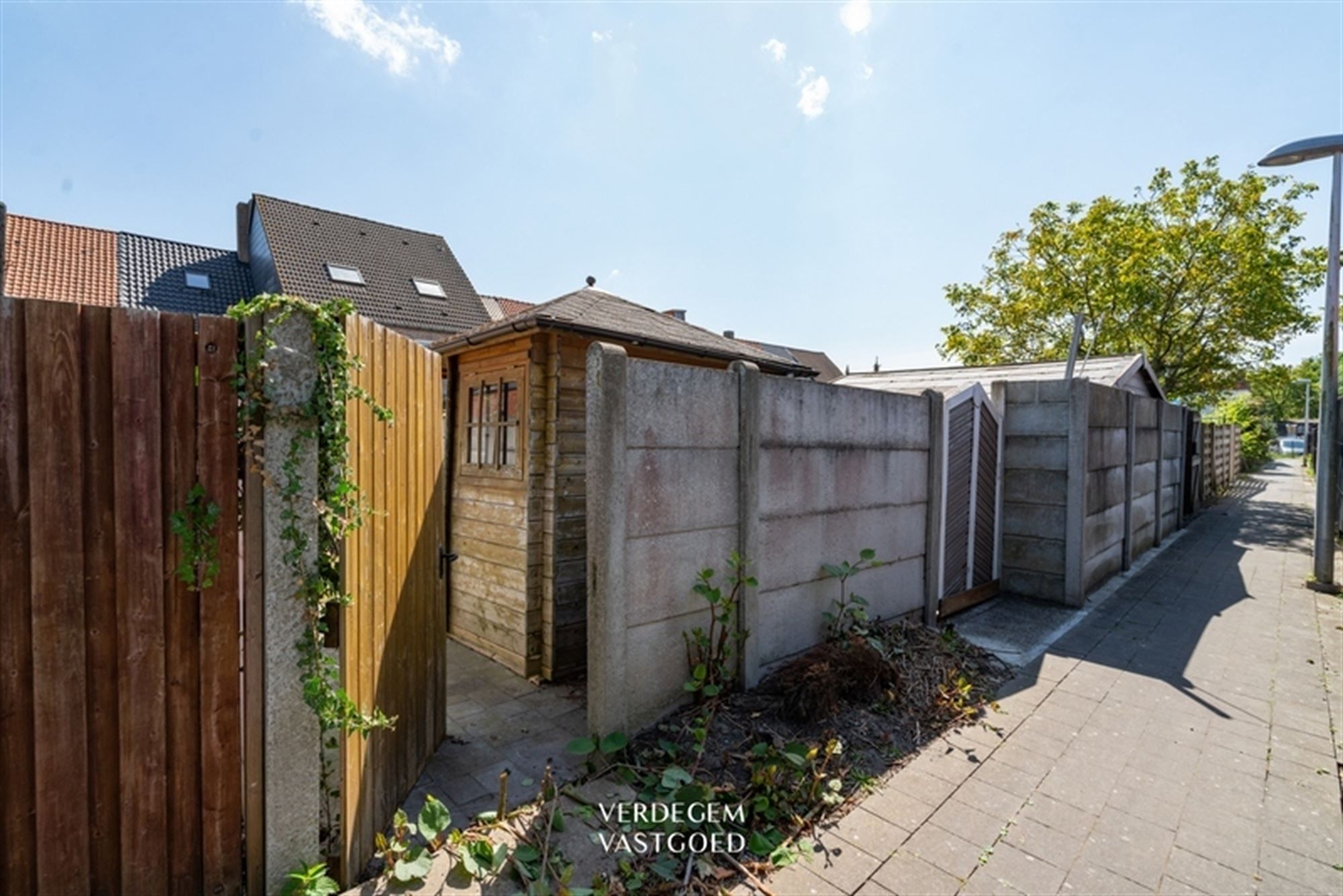 Knap gerenoveerde rijwoning met 2+1 slaapkamers en stadstuin met uitweg foto 15