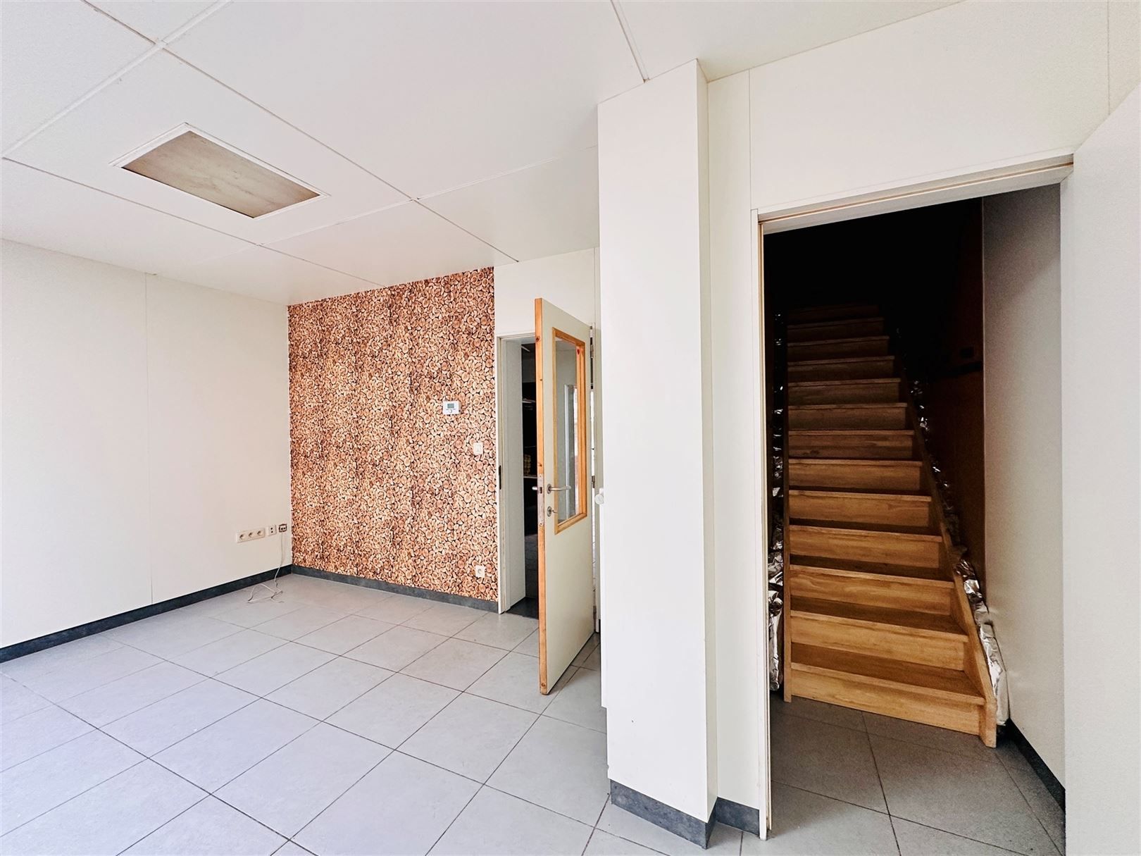 Ruime woning met diepe tuin in Grembergen met mogelijkheid tot handel of zelfstandige activiteit foto 11