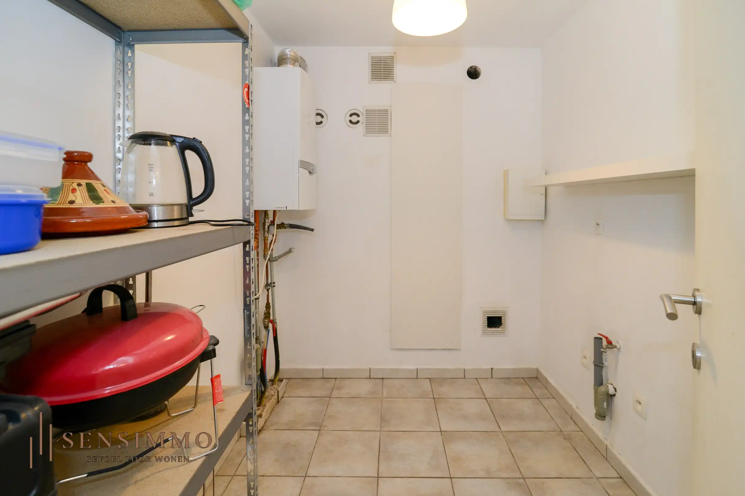 Instapklaar gelijkvloers appartement met 2 slpk foto 15