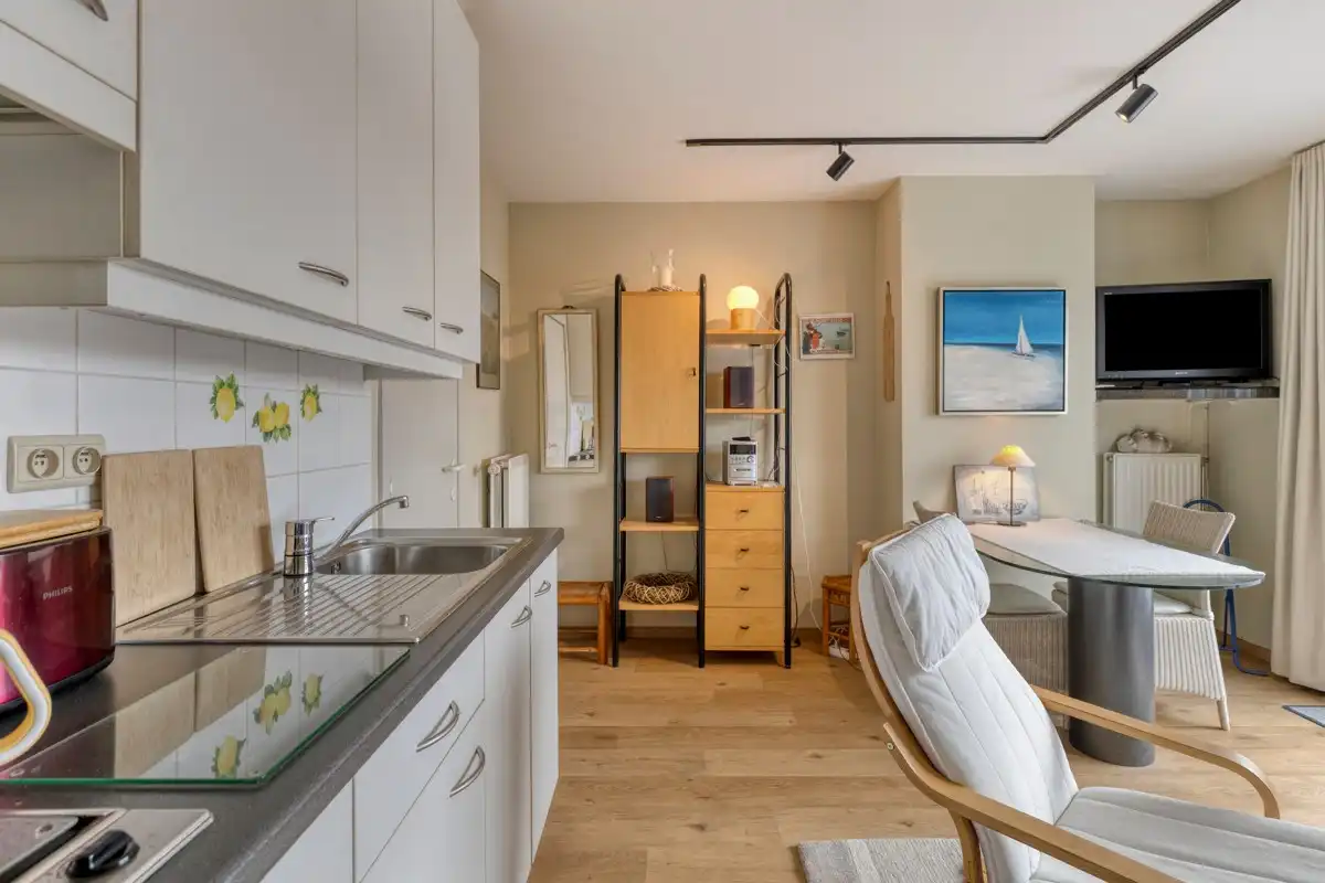 Appartement met 1 slaapkamer en twee ruime zonneterrassen, met een parkeerplaats in het gebouw die samen met het appartement aangekocht dient te worden. foto {{pictureIndex}}