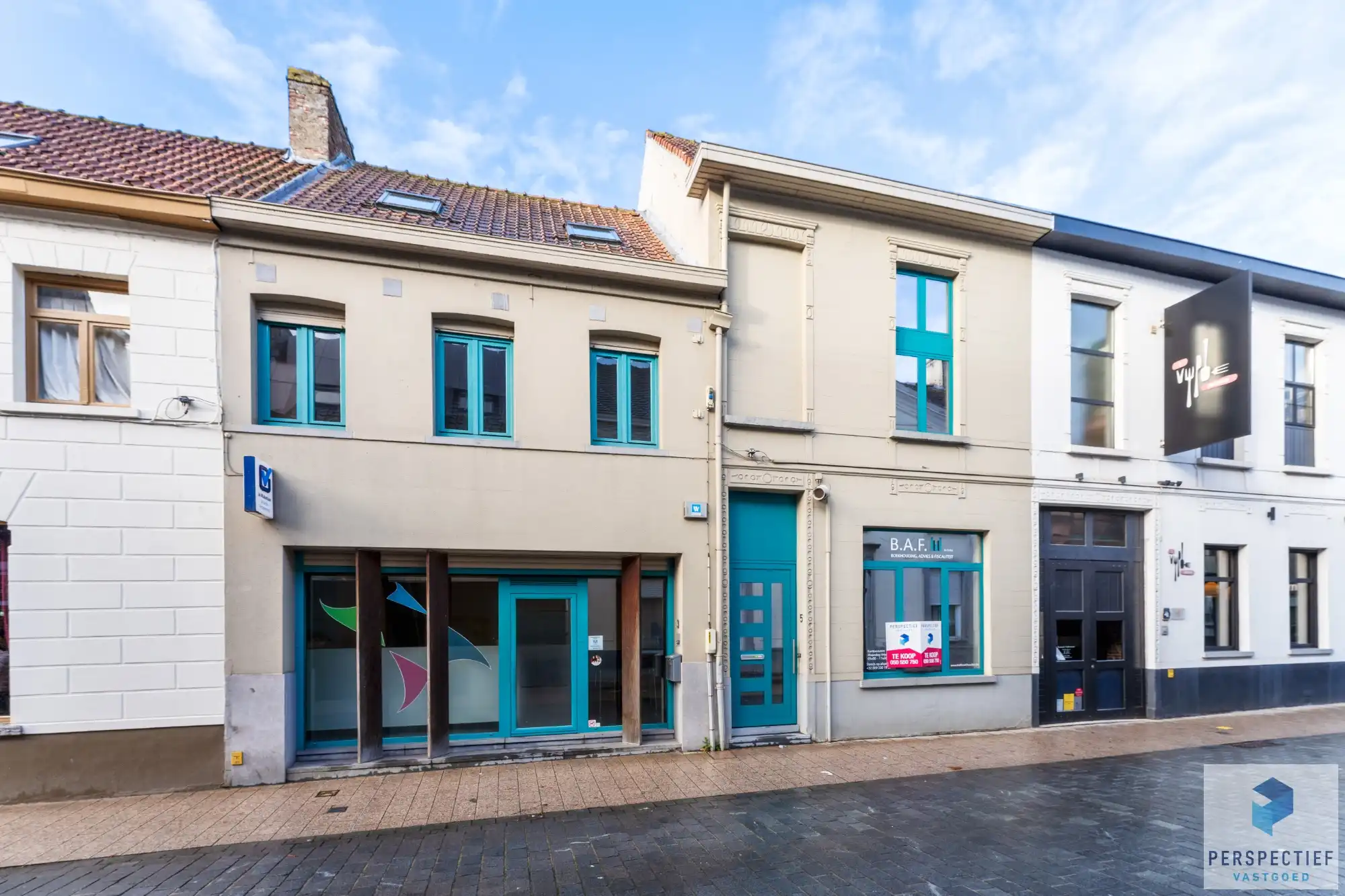 Veelzijdig handelshuis/kantoorgebouw foto 2