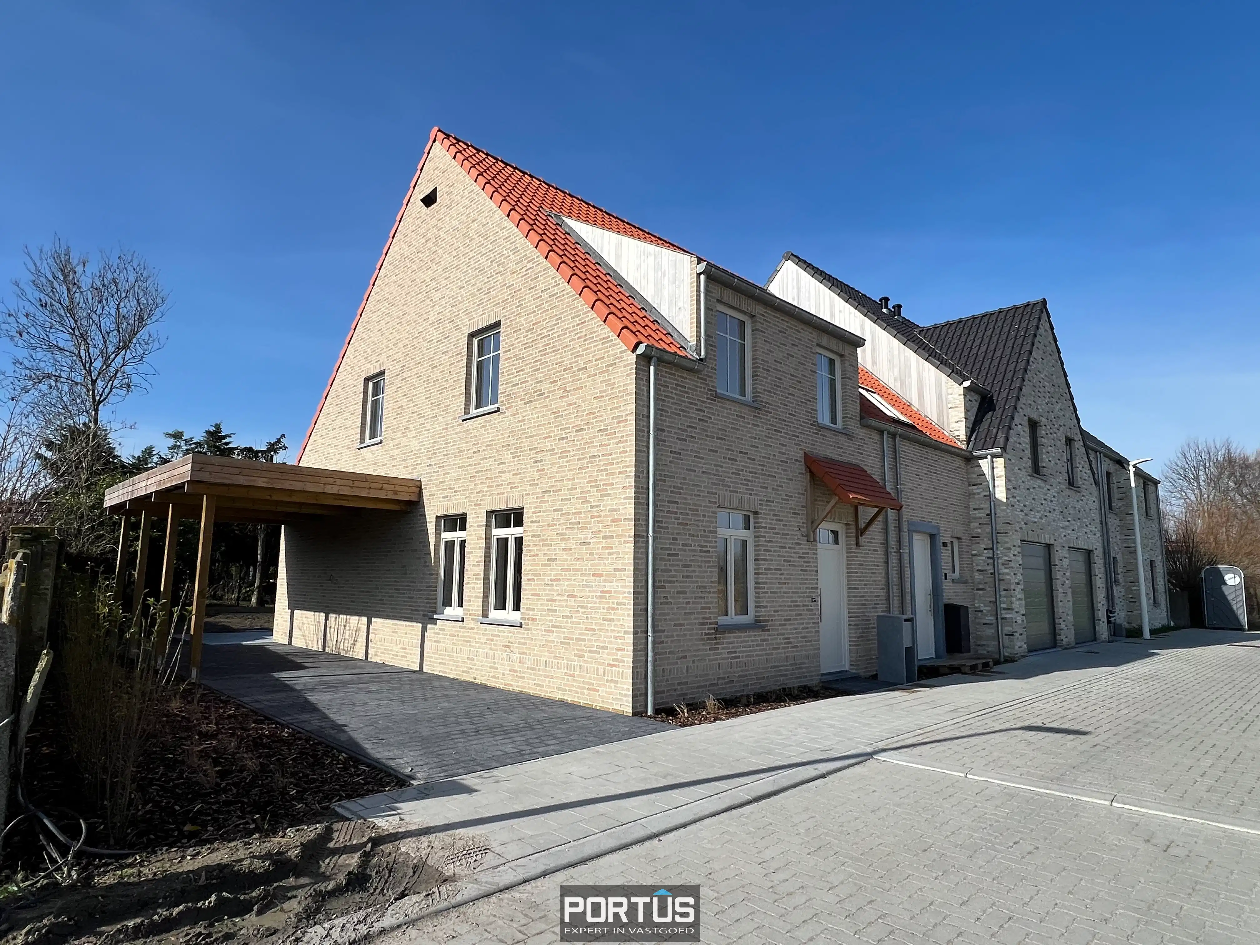 Energiezuinige nieuwbouwwoning met 3 slaapkamers en carport te huur foto 2