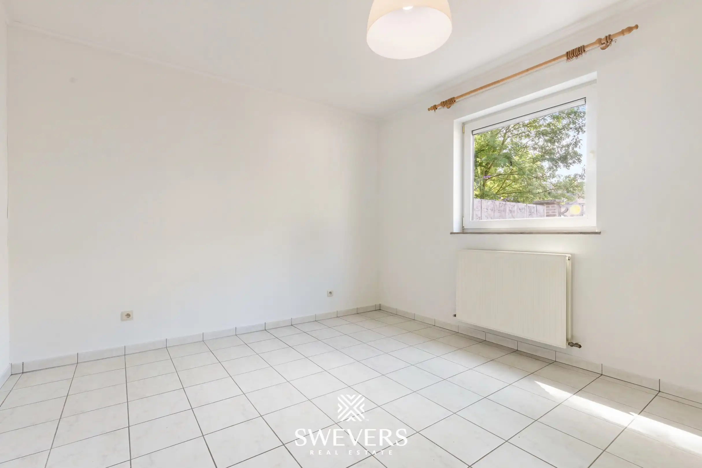 Gelijkvloers 2 slaapkamer appartement met terras en grote binnentuin foto 9