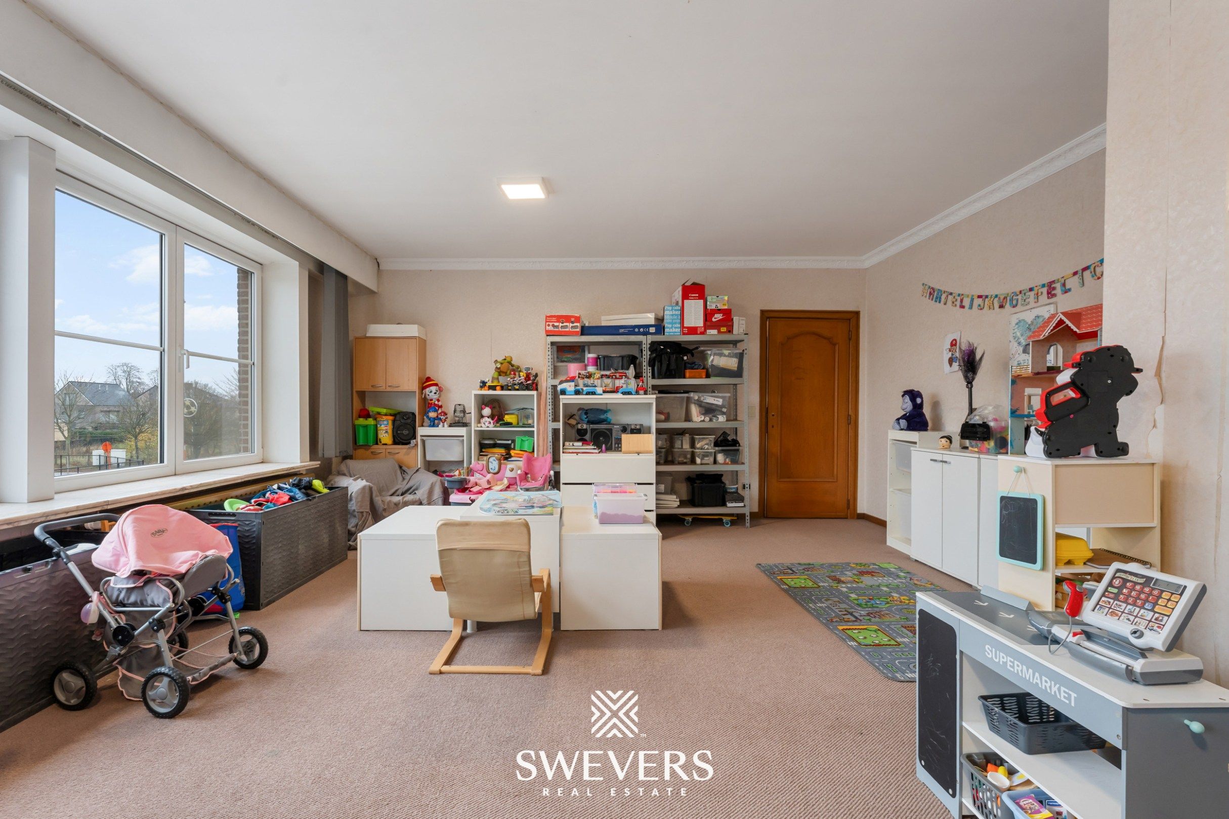 Opbrengsteigendom met handelspand, ruim appartement en uitbreidingspotentieel in hartje Heusden-Zolder foto 25