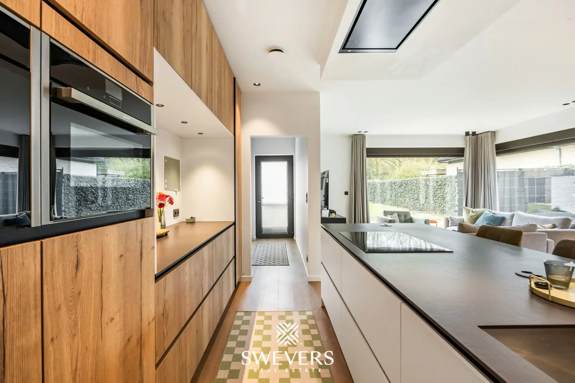Recente halfopen bebouwing met 5 slaapkamers met verrassend grote tuin in Houthalen foto 8