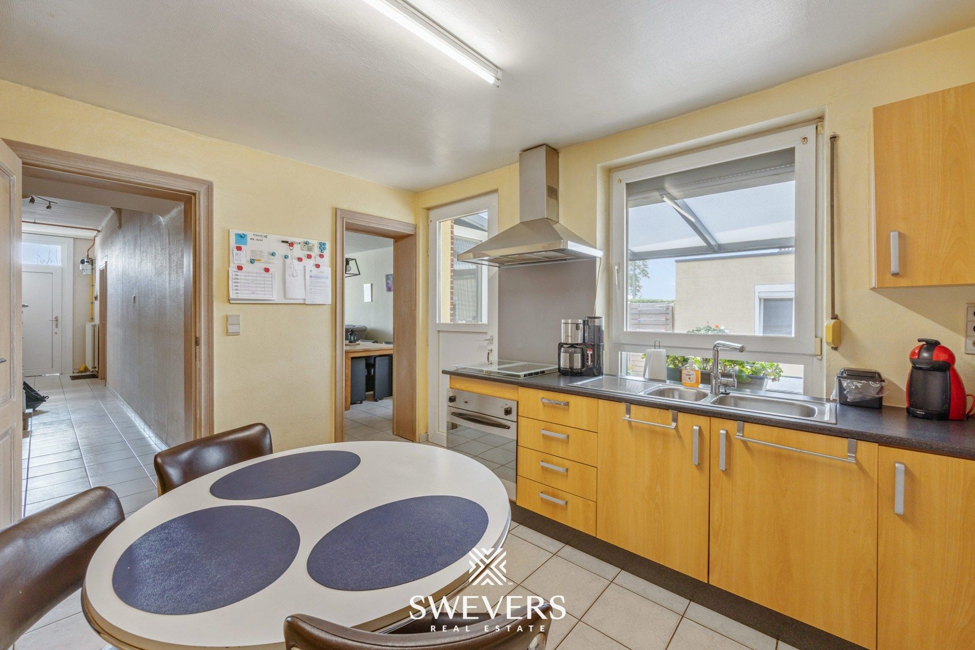 Instapklare gezinswoning met ruimte, tuin en rendement in Leopoldsburg foto 12