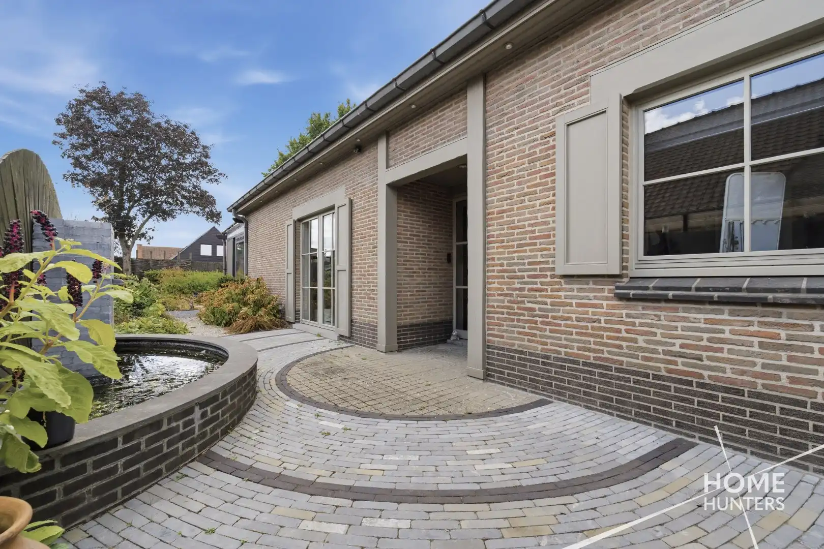 Alleenstaande woning met prachtige tuin en tal van extra troeven in een rustige wijk te Wervik foto 14