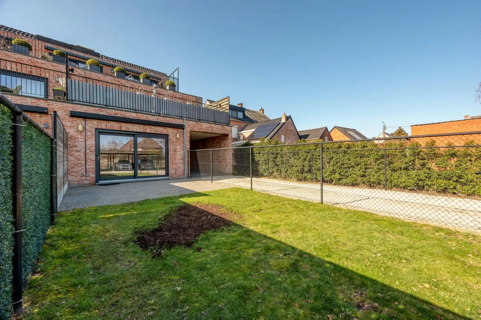Energiezuinig gelijkvloers appartement met carport in het centrum van Broechem foto 18