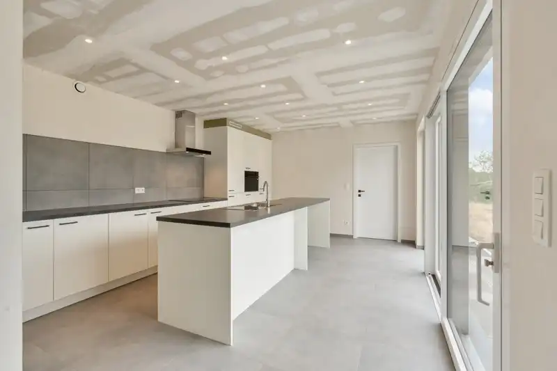 Totaal gerenoveerde woning op een perceel van 11are foto 11