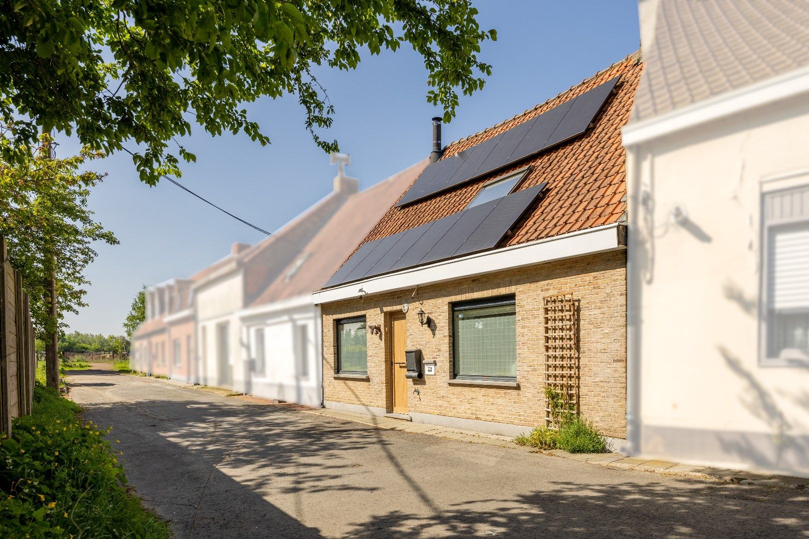 Energiezuinige woning met uitweg èn garage foto {{pictureIndex}}