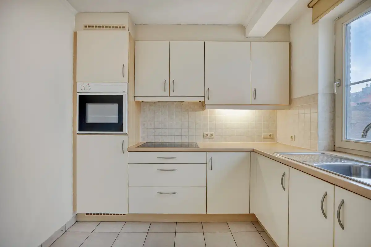 Ruim 2 slaapkamer appartement in het hartje van Koksijde met aankoopmogelijkheid van een garage foto 7