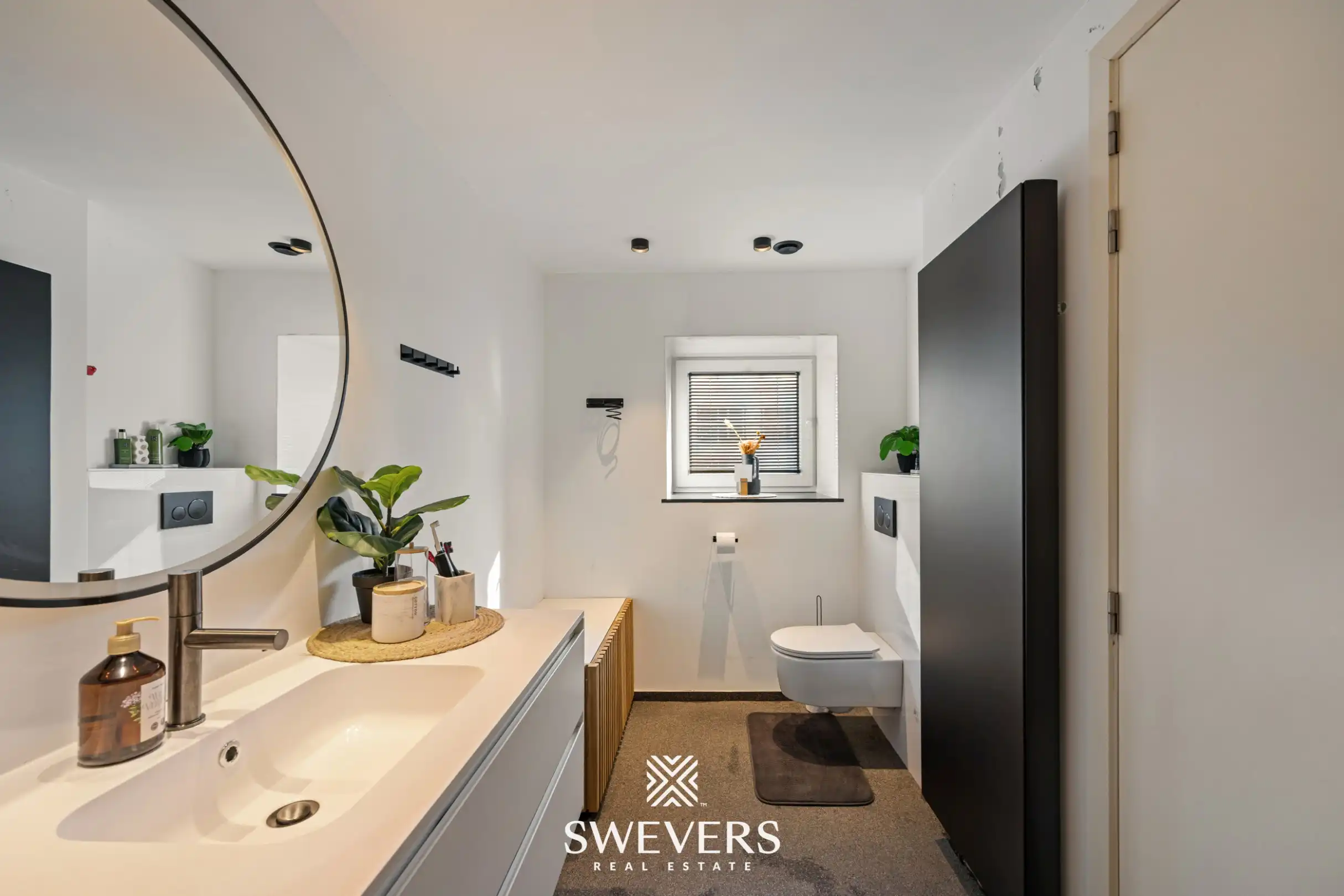 Instapklare en volledig gerenoveerde woning met tuin op rustige ligging in Leopoldsburg foto 18