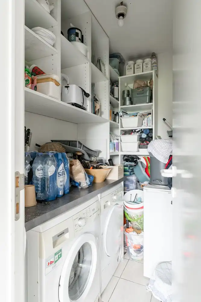 Lichtrijk instapklaar duplexappartement met 2 slaapkamers en ondergrondse parking foto 9