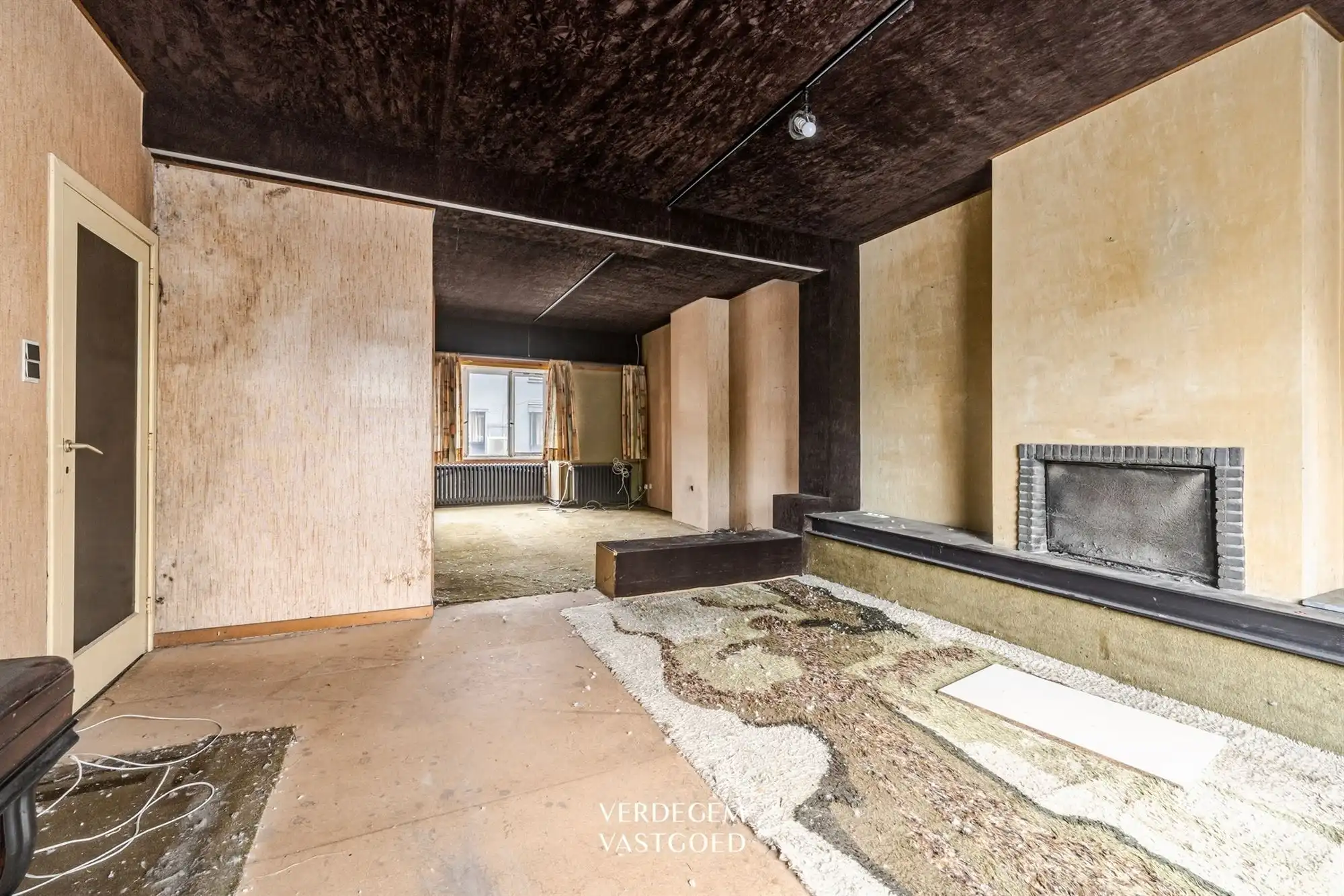 Renovatieproject: centraal gelegen handelspand met woonst en tuin foto 10
