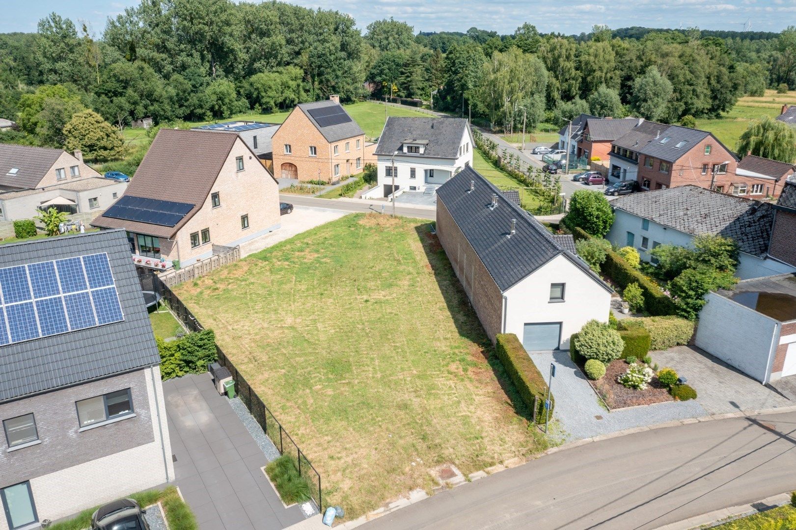 Landelijk en rustig gelegen perceel bouwgrond bestemd voor halfopen bebouwing, op 4a 44ca, vlakbij het centrum van Hoeselt foto 7