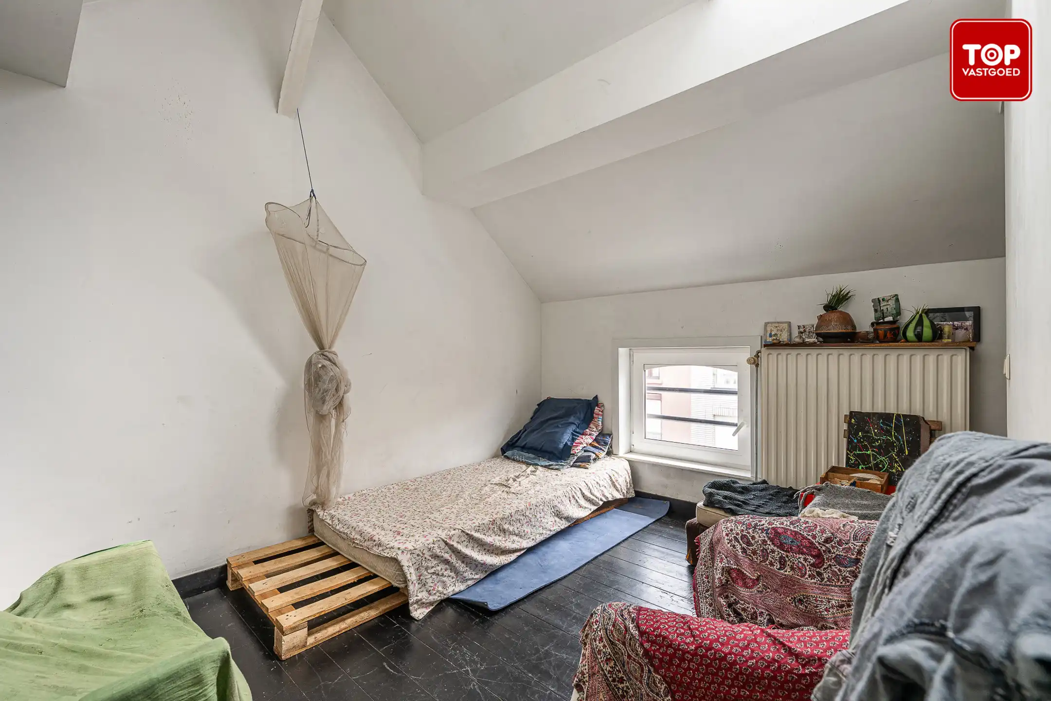 Gezellige instapklare rijwoning met een TOP ligging foto 13